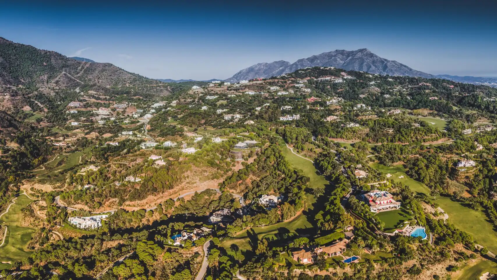 Aerial view of La Zagaleta estate with mountains