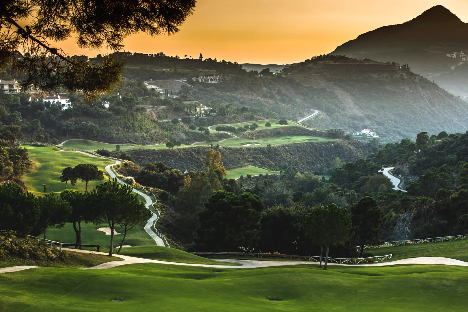 La Zagaleta golf course at sunset with mountain views